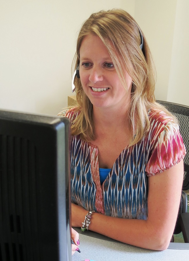 Image of lady at a computer